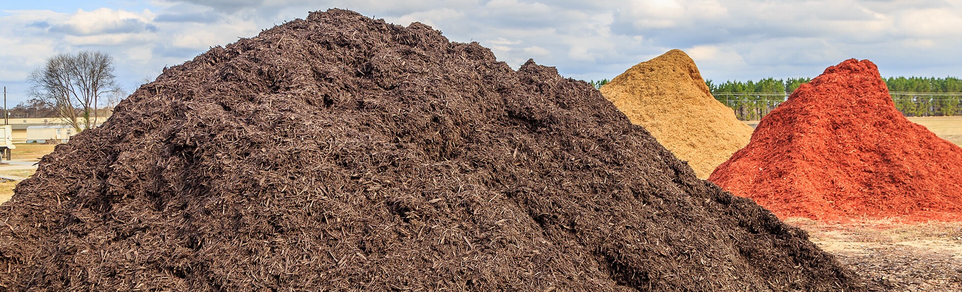 piles of different colored mulch